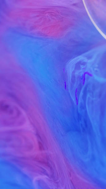 istock Glitter ink paint blend glitter blue pink gradient 2165293375