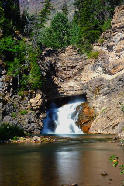 Running Eagle Falls Glacier National Park Montana