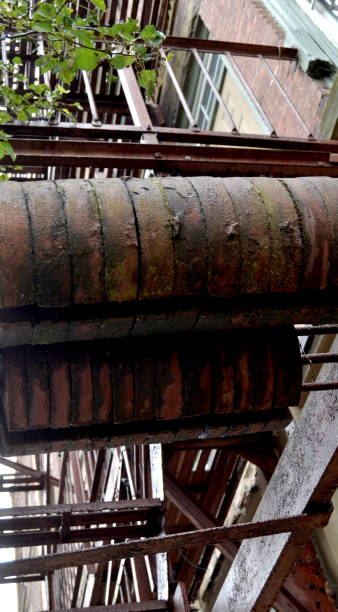 istock Old Metal Emergency Exit Fire Escape Stairs from 1800s 2165295341