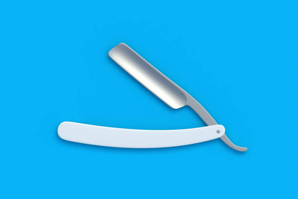 A close-up shows a razor with a red handle and a blue-black blade head. Sharp blades are clearly visible, ready for use. A bright pink background creates a modern and contrasting look.