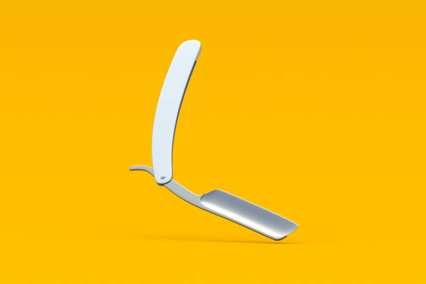 Falling straight razor for shaving on orange background. Barber tool. Barbershop accessory. Professional instrument. 3d render