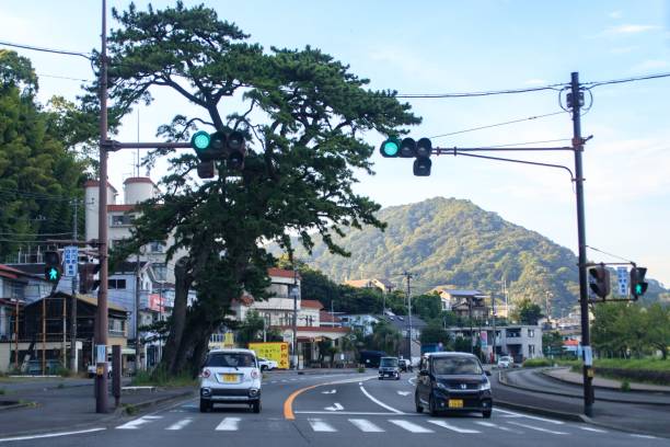 istock Traffic light intersection on a sunny day in a Japanese town 2165303618