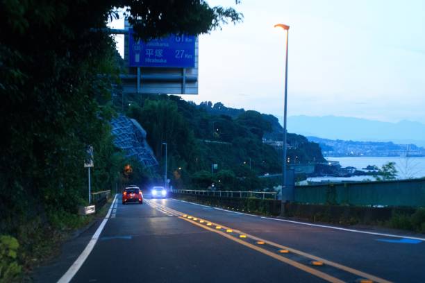 istock Twilight Drive Along the Coastal Roadway 2165303807