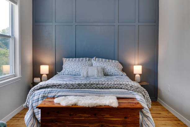 istock Charming Bedroom With A Blue Accent Wall And Cozy King-Size Bed 2165303876