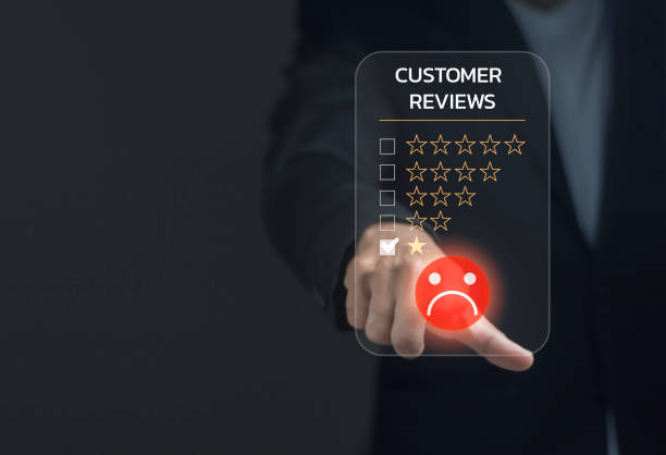 istock A person is pressing a red button on a screen that says Customer Reviews 2165303977