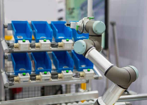 Robots pick up parts from rack. Smart warehouse. Robots pick up parts from plastic bin rack. sorter machine stock pictures, royalty-free photos & images