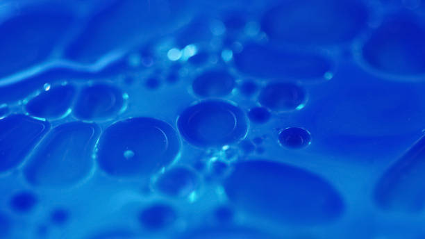 istock Serum bubbles oil fluid blue paint water droplets 2165305065