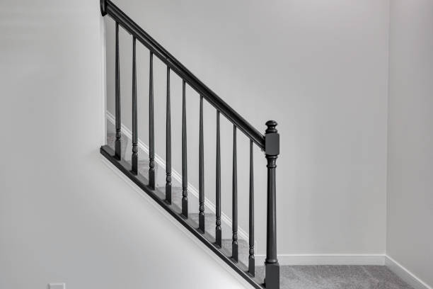 istock Modern Staircase With Black Railing And Grey Carpeted Steps In Bright Home. 2165305280