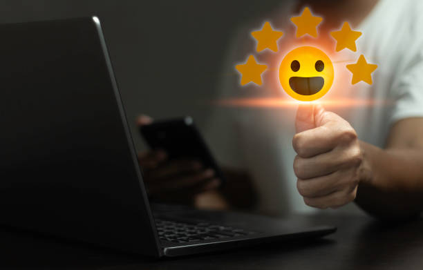 istock A man is holding a laptop and a cell phone 2165305654