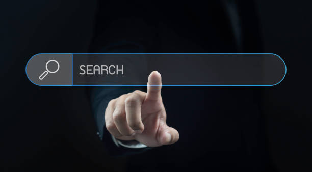 istock Businessman hand touching search bar with copy space for your text. 2165306204