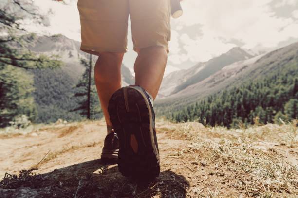 istock Mens walk in the mountains, closeup 2165308962