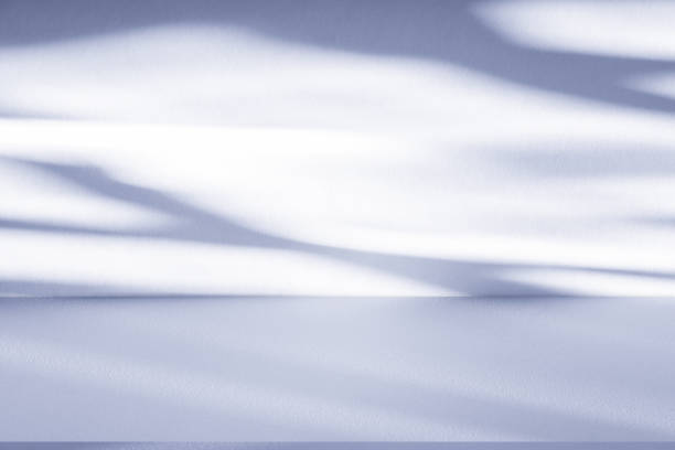 istock Studio style background wall decoration presentation uses white and blue tones. with shadows cast from a nearby window, concept creating a decorative 2165310984