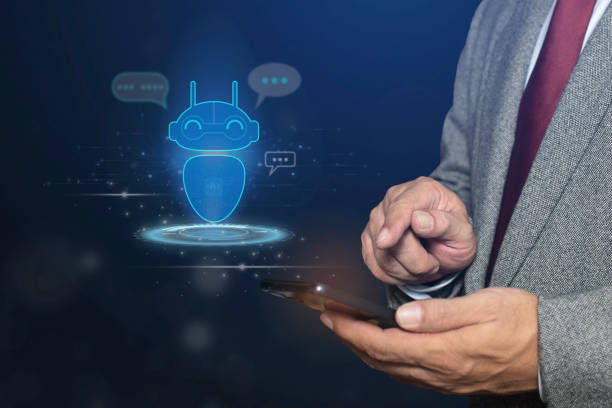 istock Businessman using smartphone ai chatbot infographic. Chatbot conversation Ai Artificial Intelligence technology online customer service. Digital chatbot, robot application, Futuristic technology. 2165312956