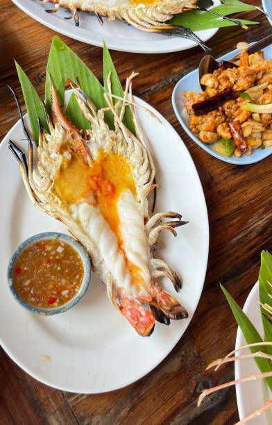 istock Grilled prawns served with spicy seafood sauce 2165314989