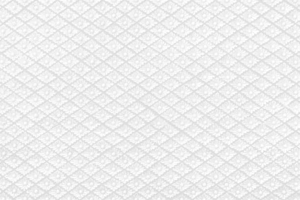 istock White Thai style wood carving flower pattern background 2165317870