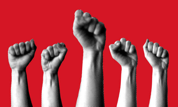 halftone hands raised up with closed fist. - kertas terpotong atau robek teknik gambar foto ilustrasi stok