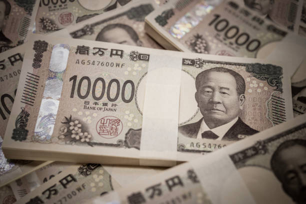istock Japan's new 10,000 yen note. Bundled million yen. Negative image. 2165320761