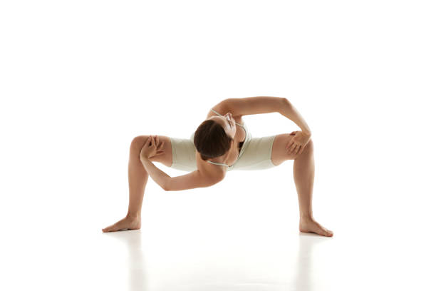 Yogini Stretching Before Doing Front Splits On Amphitheater Stairs