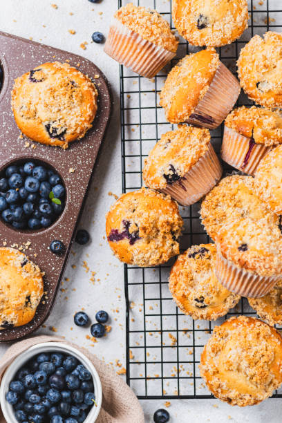 istock Blueberry muffins and blueberry berries 2165324500