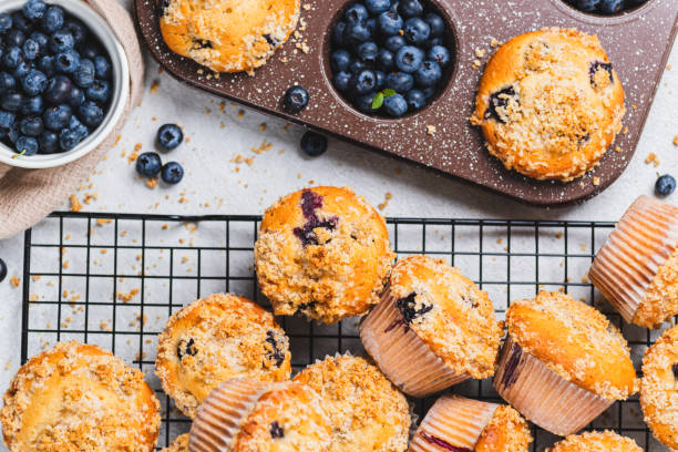 istock Blueberry muffins and blueberry berries 2165324501
