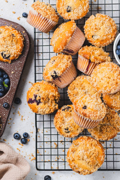 istock Blueberry muffins and blueberry berries 2165324503