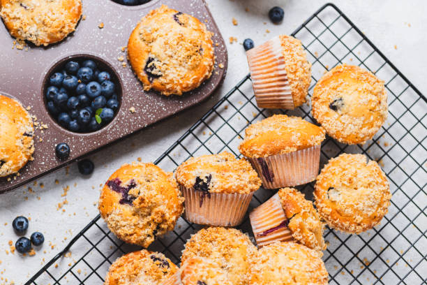 istock Blueberry muffins and blueberry berries 2165324508