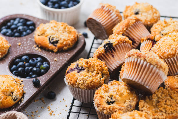 istock Blueberry muffins and blueberry berries 2165324509