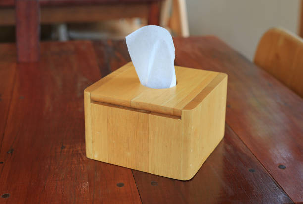 istock Wooden Tissue box on the wood table. 2165331212