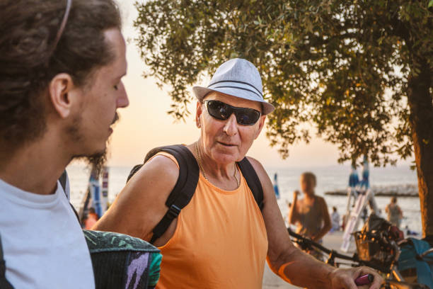 istock Leaving beach with my grandfather 2165333084
