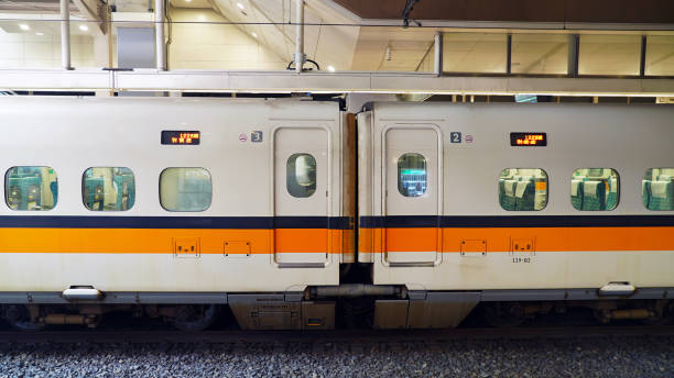 Tokyo, Japan - July 9, 2025 : W7 Shinkansen bullet train travels along an elevated railway track in Tokyo, Japan.