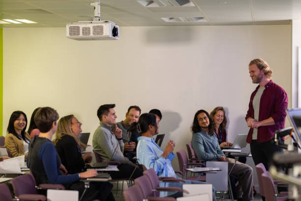 istock Lecturer Presents on Data Mining to Colleagues 2165333162