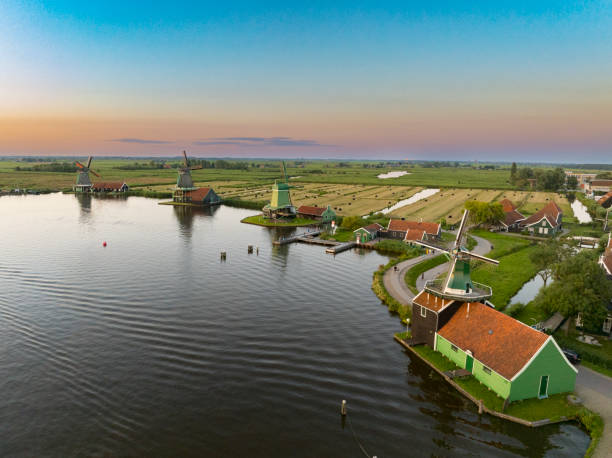 istock Zaanse Schans windmills during a summer sunset in Holland 2165338255