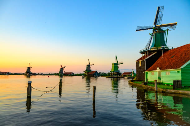 istock Zaanse Schans windmills during a summer sunset in Holland 2165338286
