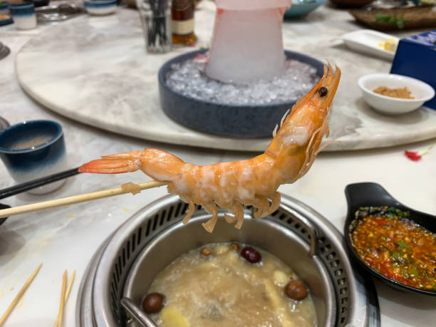 Boiled skewered shrimp and a personal Chinese hot pot