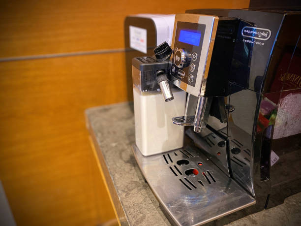 istock coffee machine test after being repaired because it was broken and installed on the table 2165343104