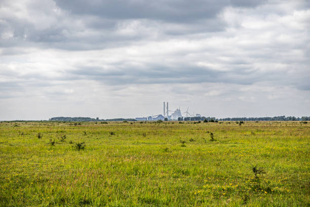 istock View to a modern powerplant over a flat landscape 2165344897