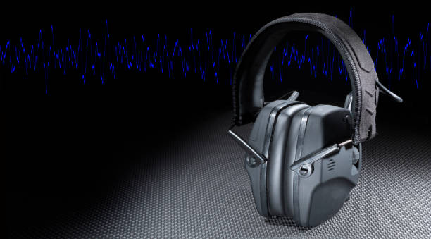 istock Noise waves running behind electronic hearing protection 2165346892