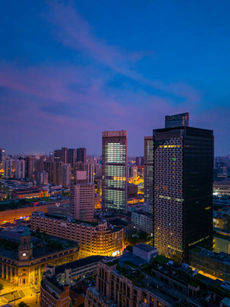 istock Aerial view of city skyline and burning clouds at sunrise in Shanghai. 2165347370