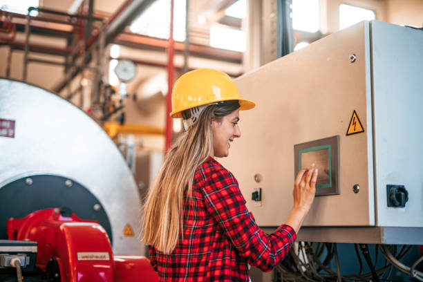 istock Female engineer working at factory 2165351548