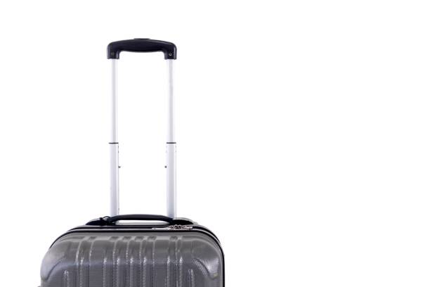 istock A gray travel luggage with with pull out handle, on a white background 2165352184
