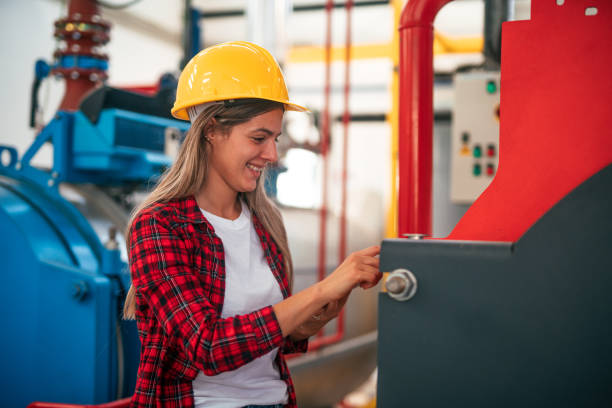 istock Female engineer working at factory 2165352366
