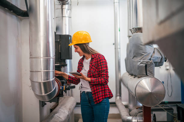 istock Female engineer working at factory 2165352536