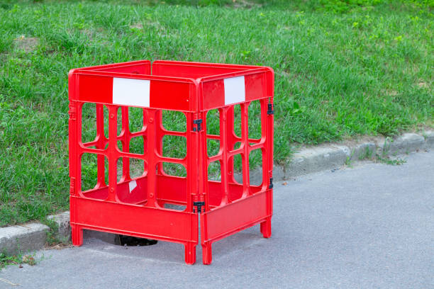 plastic road sign red warning around asphalt ground hole outdoor infrastructure
