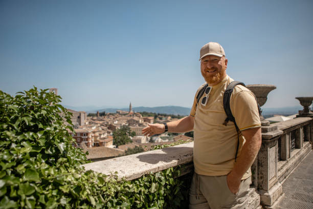 istock Handsome senior mature man sightseeing in Perugia, Umbria 2165352739
