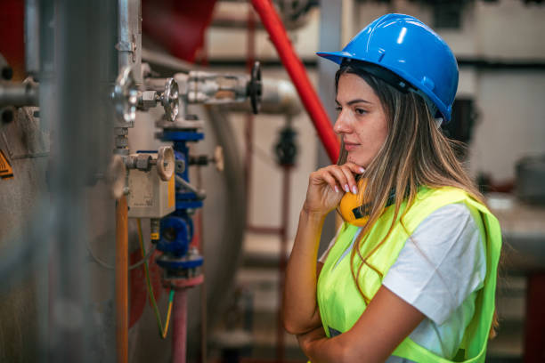 istock Female engineer working at factory 2165354096