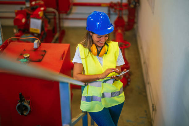 istock Female engineer working at factory 2165354764