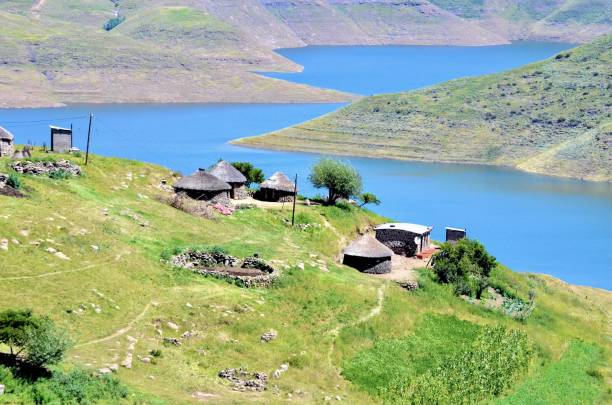 The sight of shepherds along the road is not just a pastoral vignette; it represents the enduring cultural practices of the Basotho. These shepherds, or \