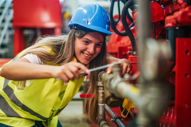 istock Female engineer working at factory 2165355319