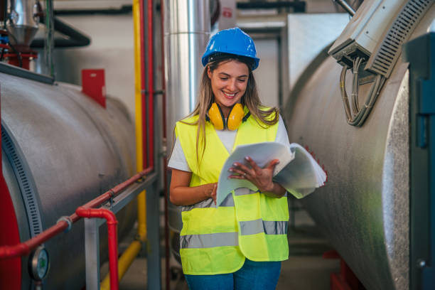 istock Female engineer working at factory 2165356193