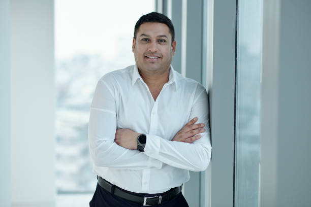 istock Confident Businessman Standing In Office 2165356416